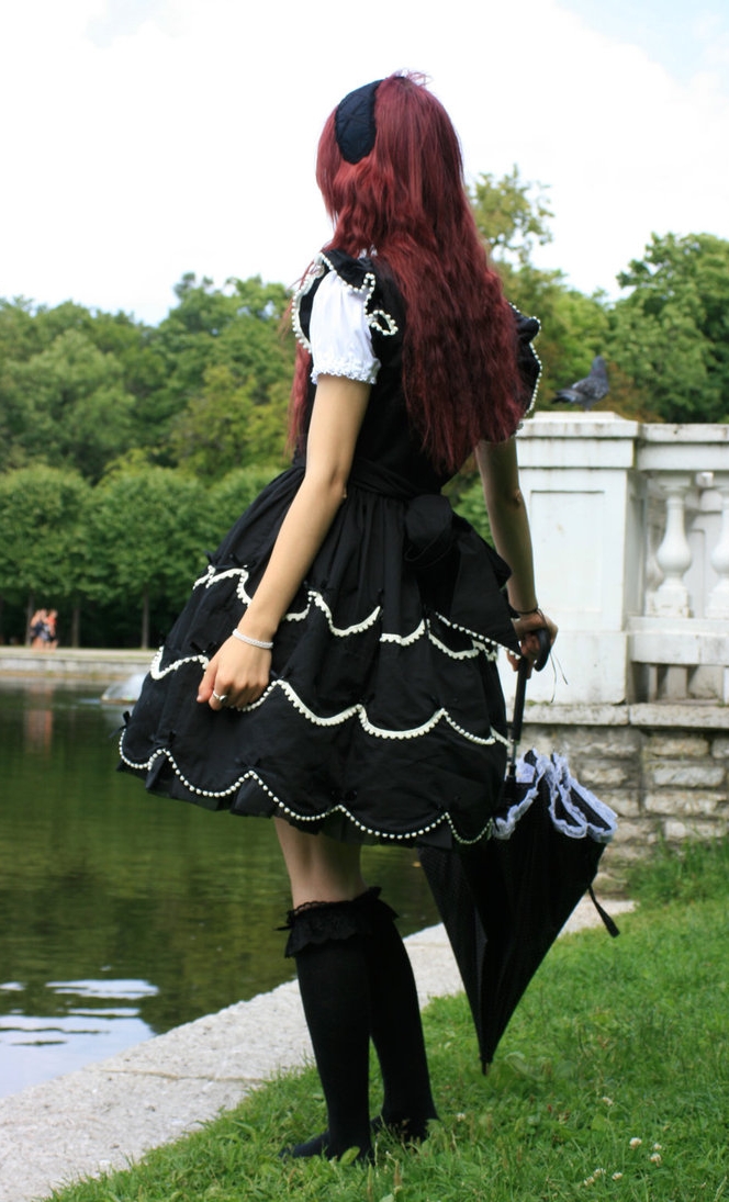 Redhead Gothic Girl wearing Black Long Socks and Black Dress